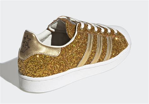 adidas shoes with gold heel.